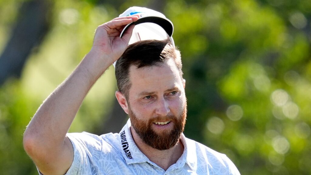 Chris Kirk tips his cap after the final round of The Sentry golf event, Sunday, Jan. 7, 2024, at Kapalua Plantation Course in Kapalua, Hawaii. (AP Photo/Matt York)