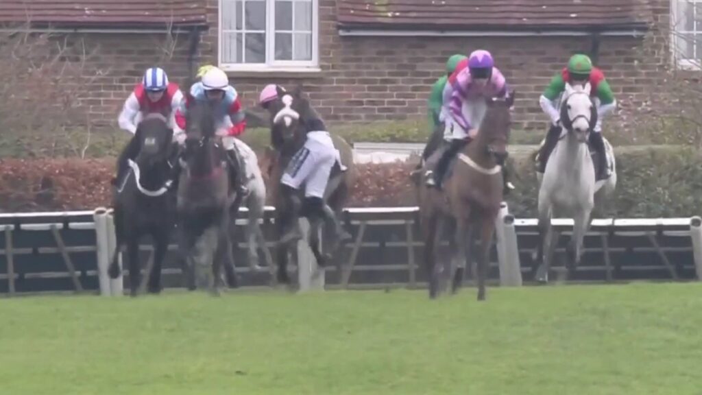 Joe Anderson clings onto Transmission during the Sussex Stayers Handicap Hurdle