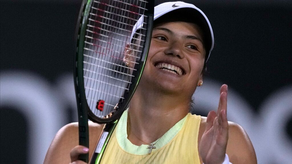 Emma Raducanu of Britain celebrates after defeating Shelby Rogers of the U.S. in their first round match at the Australian Open tennis championships at Melbourne Park, Melbourne, Australia, Tuesday, Jan. 16, 2024. (AP Photo/Louise Delmotte)