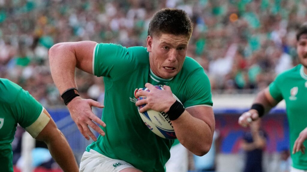 Ireland's Joe McCarthy runs to score a try during the Rugby World Cup Pool B match between Ireland and Romania at the Stade de Bordeaux in Bordeaux, France, Saturday, Sept. 9, 2023. (AP Photo/Themba Hadebe)