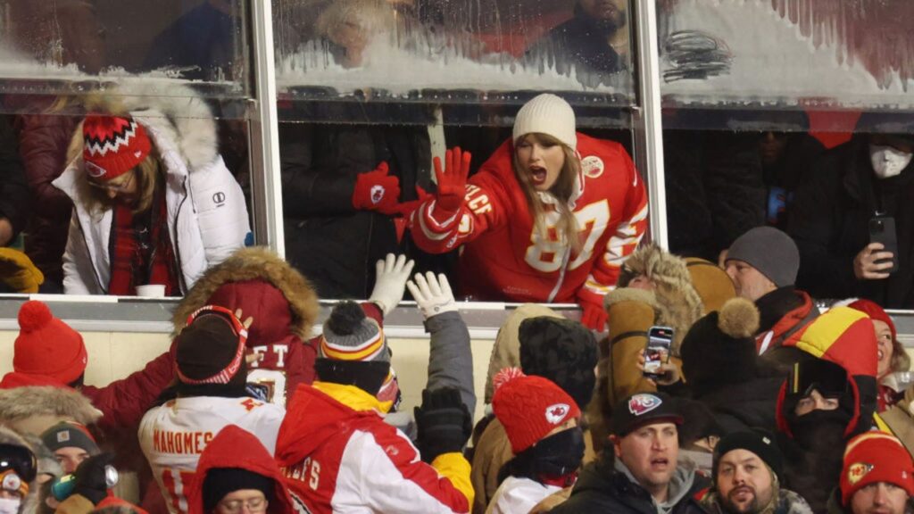 Taylor Swift Wears Custom Travis Kelce Puffer Jacket for Dolphins-Chiefs Game in Frigid Kansas City