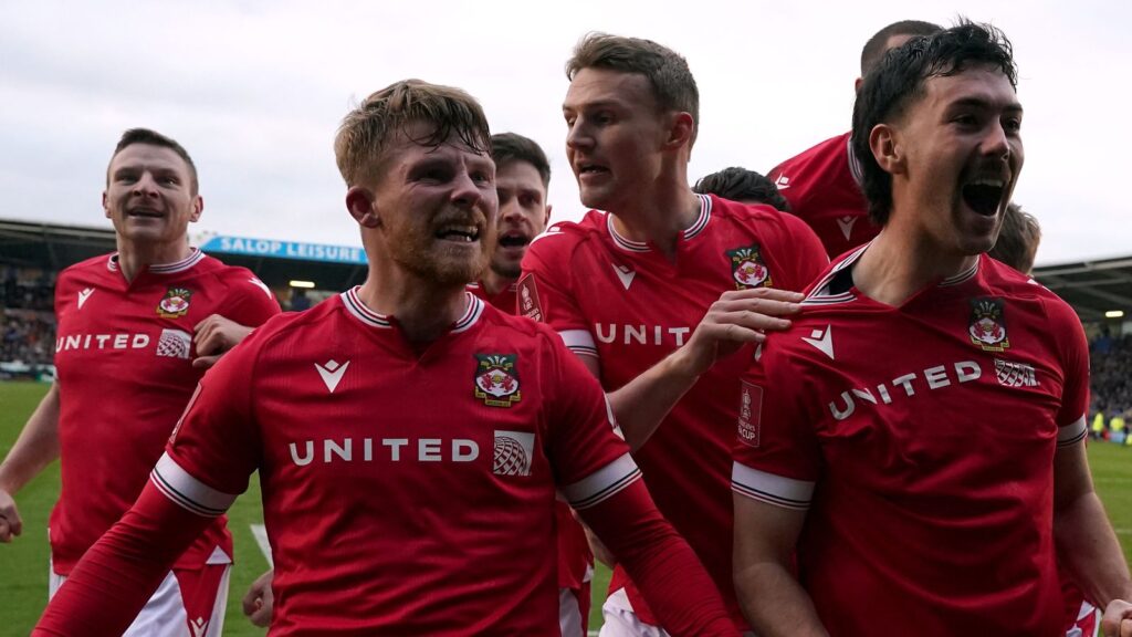 Tom O'Connor (far right) scored the winning goal for Arexham at Shrewsbury