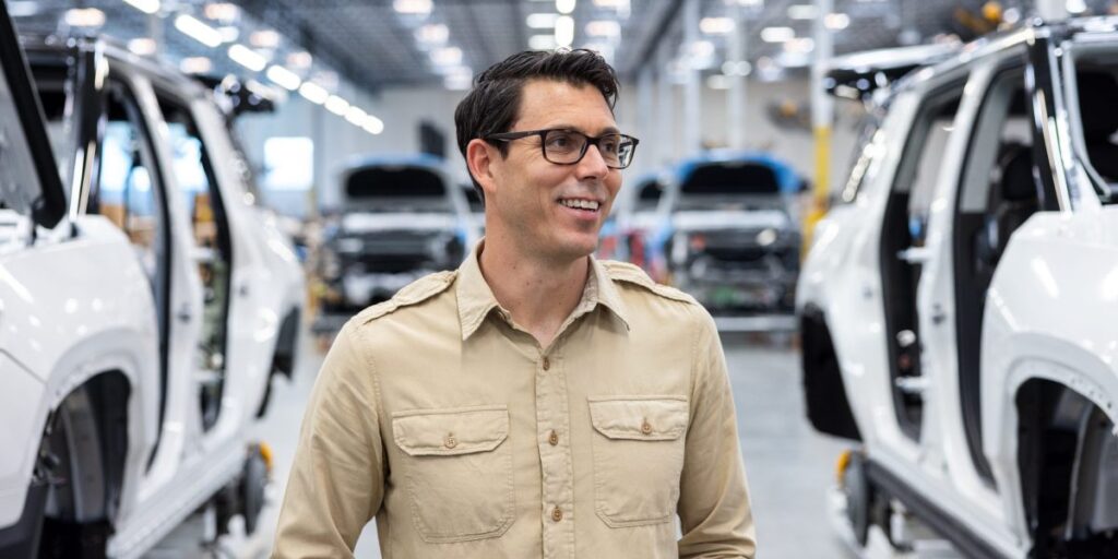 Rivian CEO blames Fed for making him cut a tenth of his staff