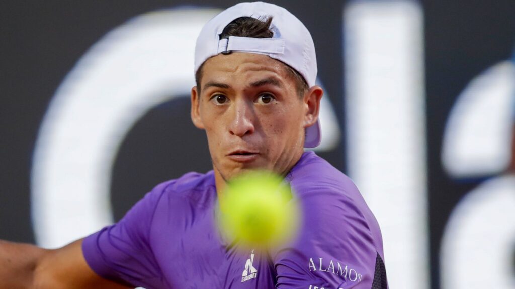 Sebastian Baez prepares to hit a return shot against Mariano Navone, both of Argentina, during the final match of the Rio Open tennis tournament in Rio de Janeiro, Brazil, Sunday, Feb. 25, 2024. (AP Photo/Bruna Prado)