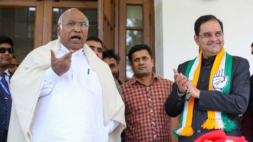 Brijendra Singh (R), BJP MP from Hisar, with Congress president Mallikarjun Kharge (L) in New Delhi, Sunday