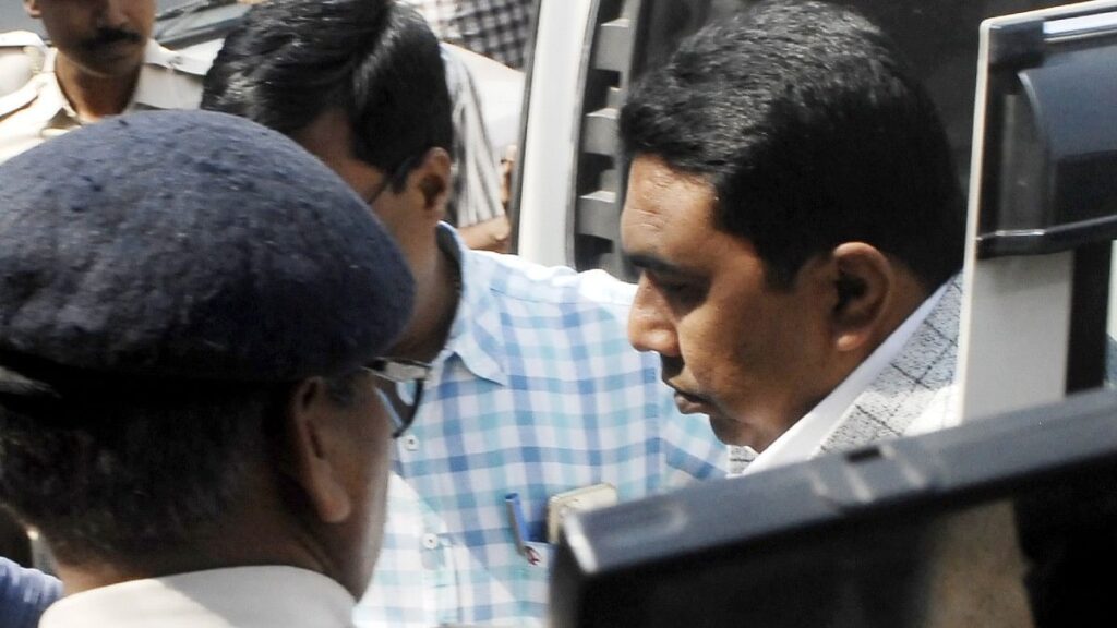 File photo of suspended TMC leader Sheikh Shahjahan being brought to Bhabani Bhawan in the CID office in Kolkata