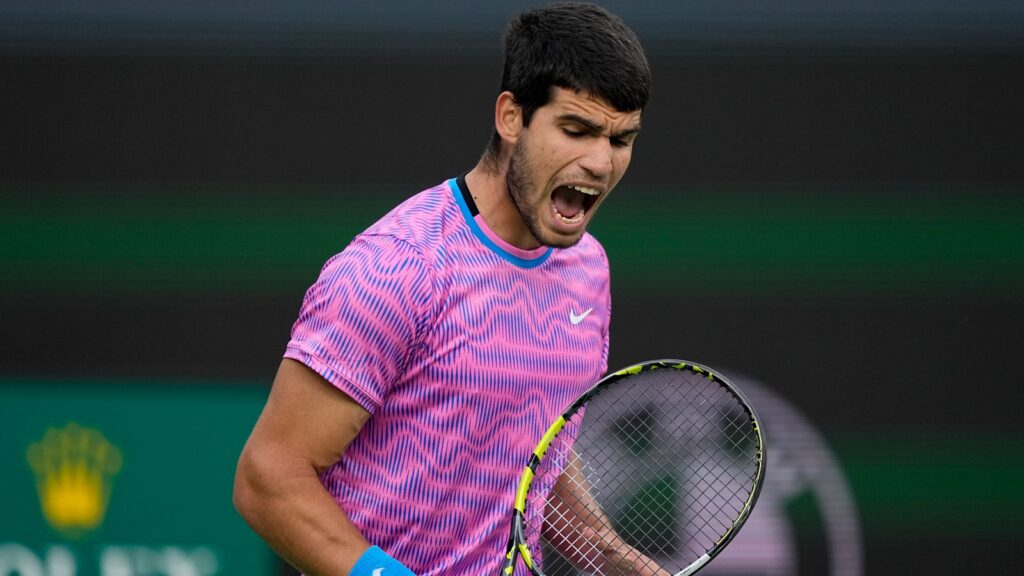 Carlos Alcaraz, of Spain, celebrates winning a point against Jannik Sinner, of Italy, during a semifinal match at the BNP Paribas Open tennis tournament, Saturday, March 16, 2024, in Indian Wells, Calif. (AP Photo/Mark J. Terrill)