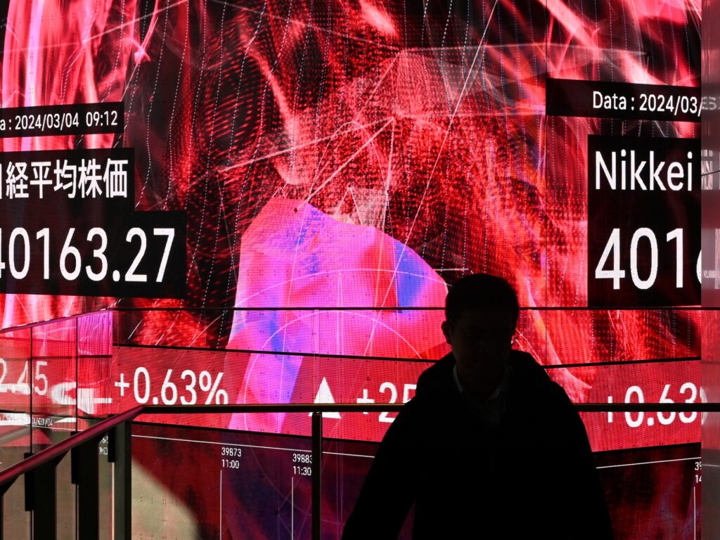 Japan’s Nikkei stock index passes 40,000 for first time amid AI fanfare | Financial Markets