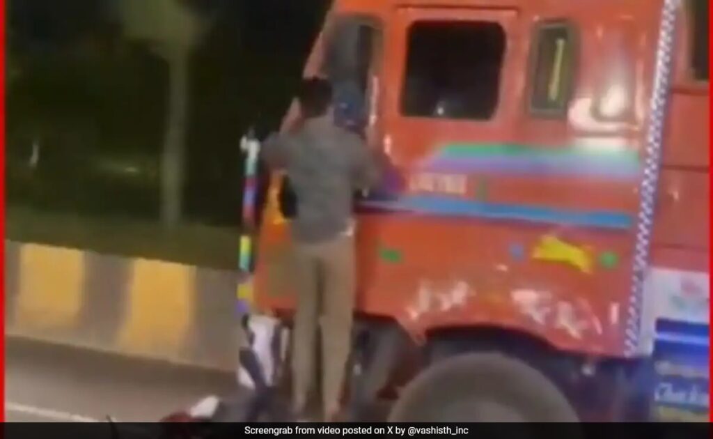 Hyderabad Man Stands On Speeding Truck As It Drags Bike Underneath, Driver Arrested