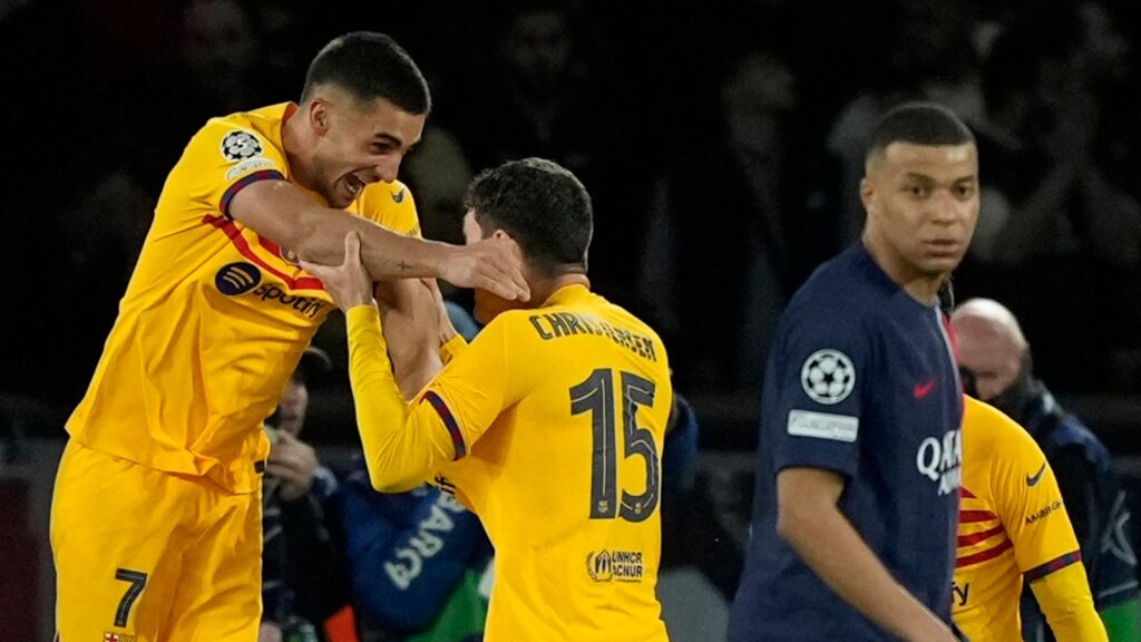 Barcelona's Andreas Christensen, center, right, celebrates after scoring his side's third goal